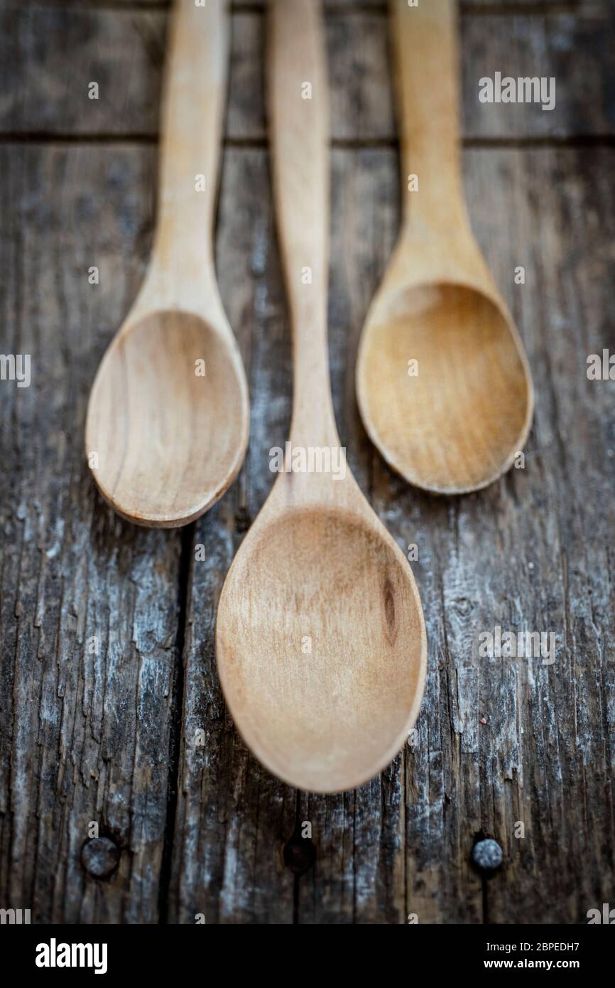 Wood spoon over a wood table Stock Photo