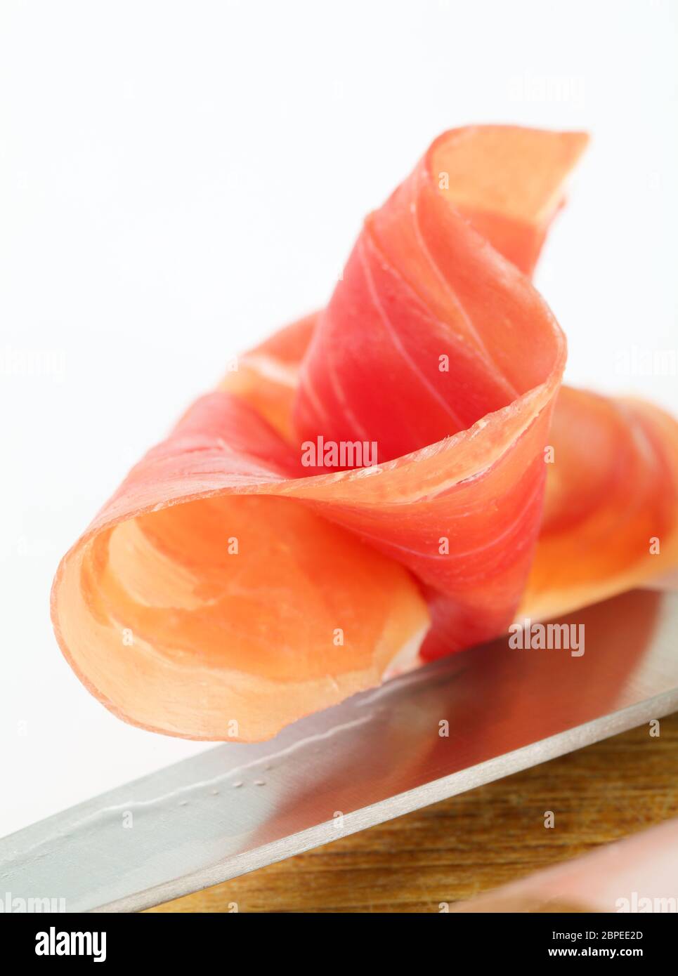 Thin slice of dry cured smoked ham Stock Photo Alamy