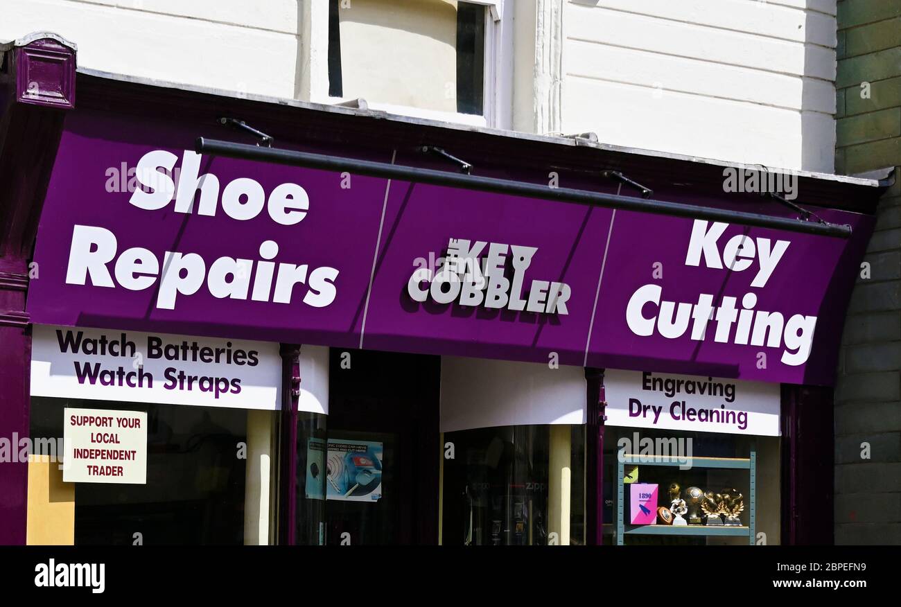 Shop front. The Key Cobbler. Shoe repairs, Key cutting. Market Place, Kendal, Cumbria, England, United Kingdom, Europe. Stock Photo