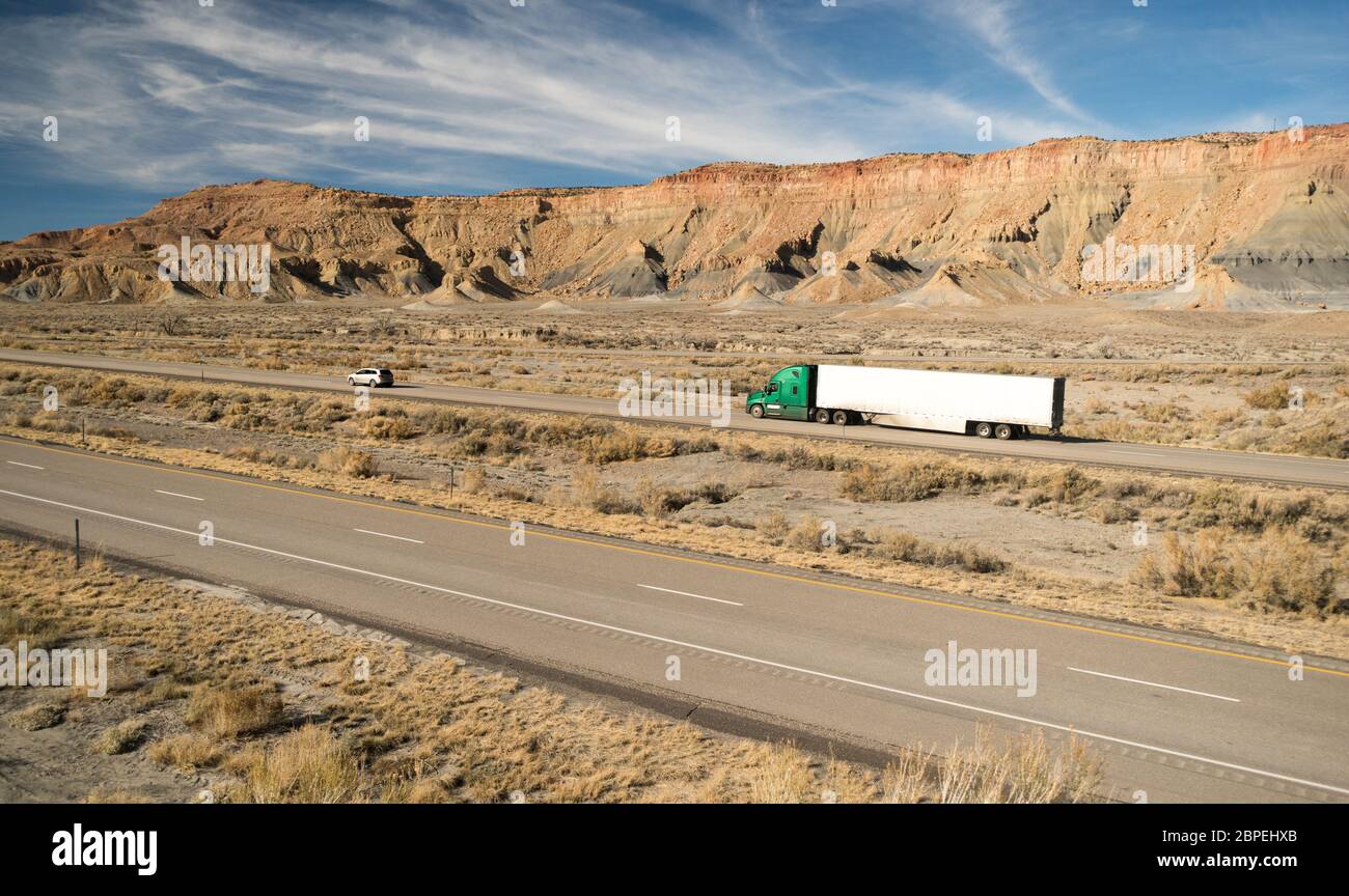 A trucker navigates this Utah highway in his big rig Stock Photo - Alamy