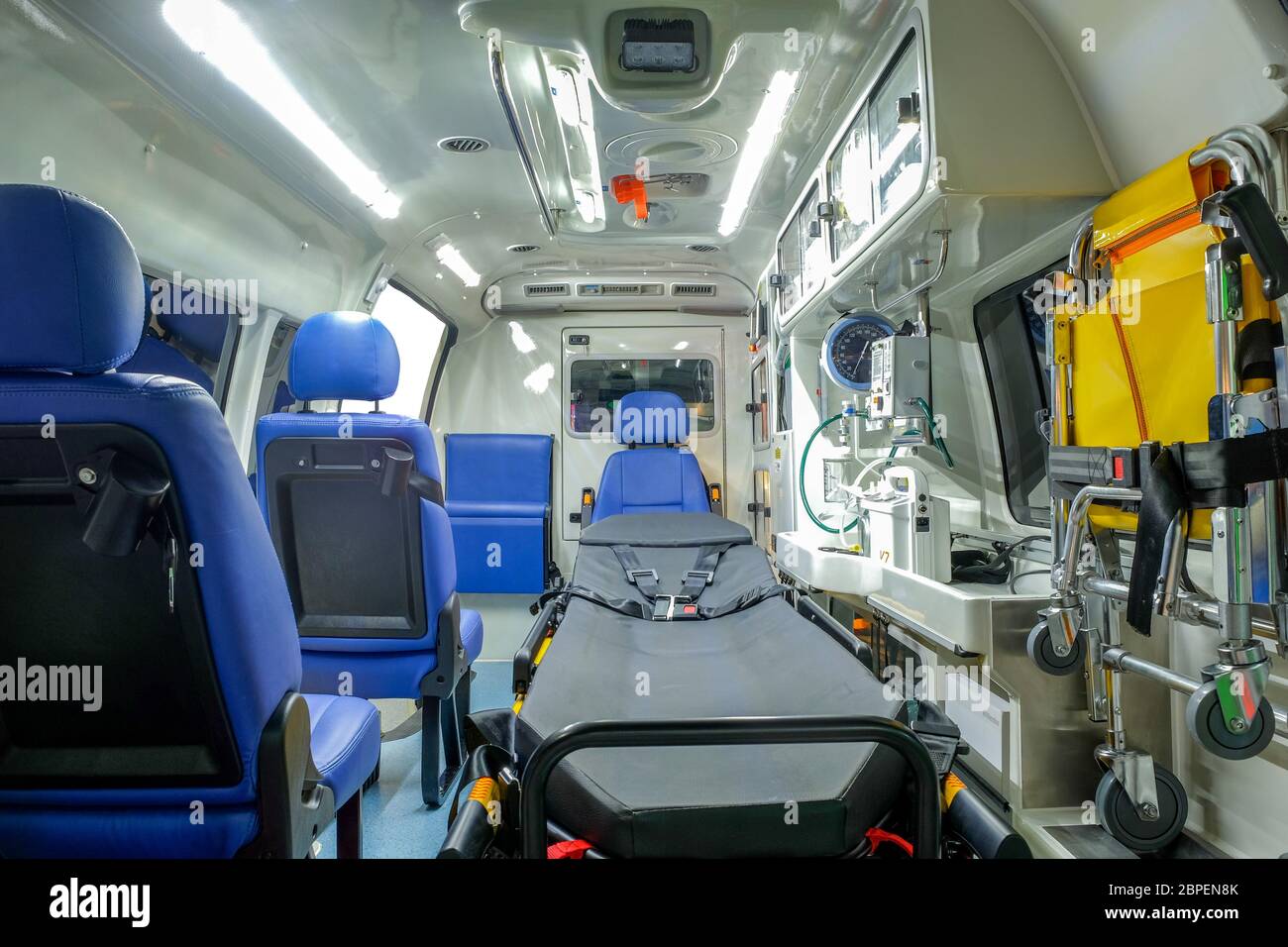 Inside an ambulance car with medical equipment for helping patients