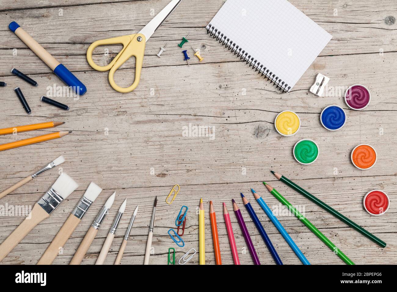 school accessories on a wooden background Stock Photo