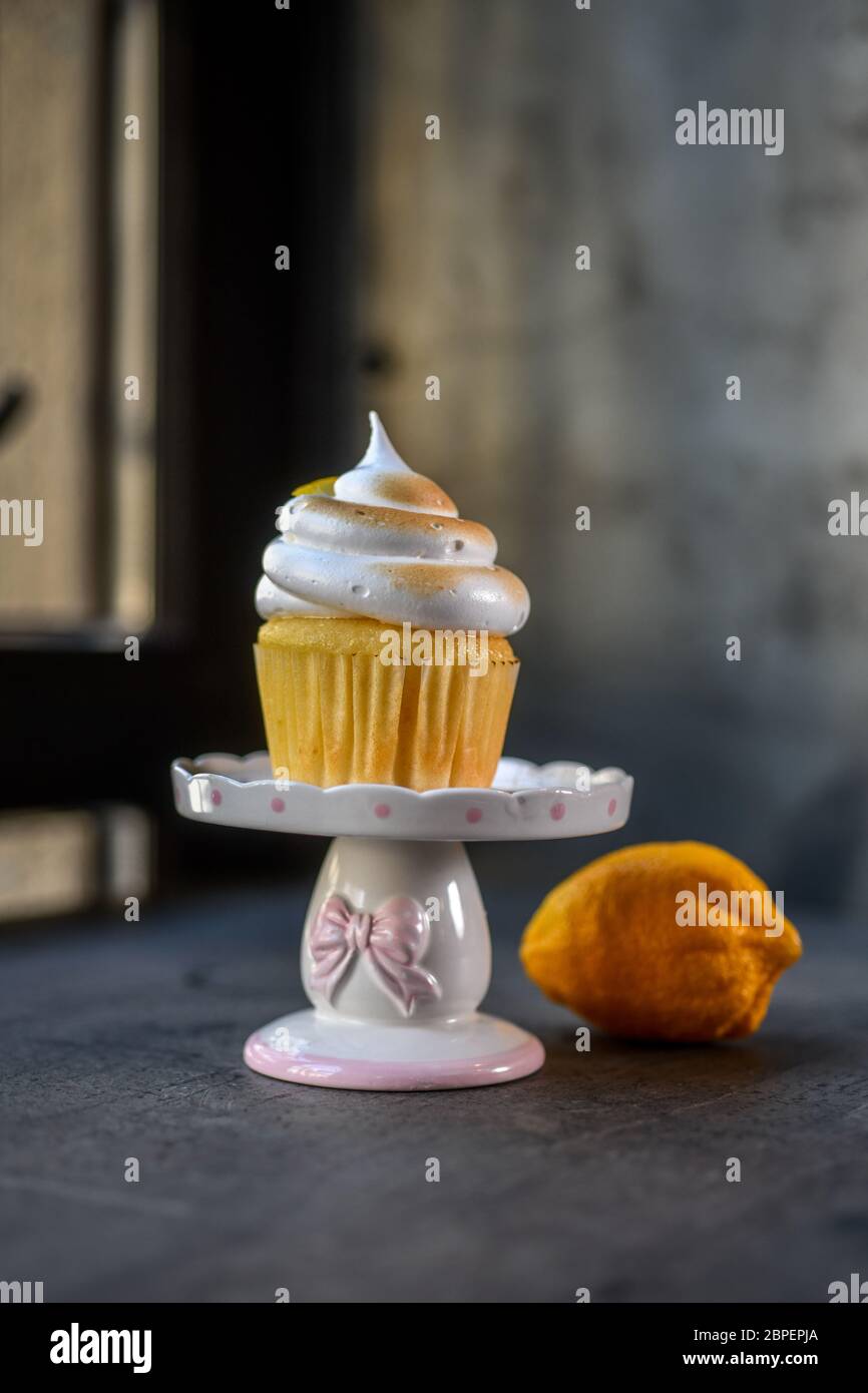 Cupcake on a wood table Stock Photo
