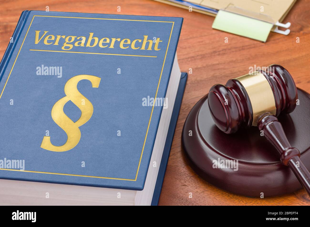 Gesetzbuch mit Richterhammer - Vergaberecht Stock Photo