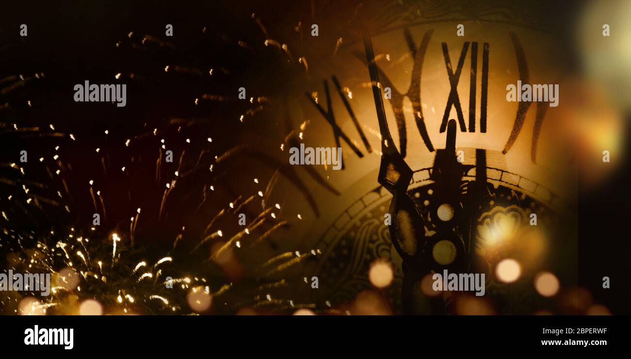 Fireworks and bokeh with a clock for a new year background Stock Photo ...