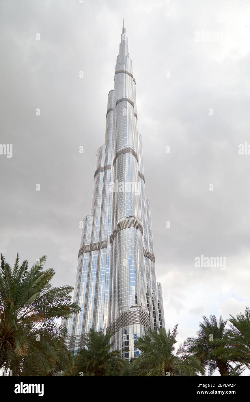 DUBAI, UNITED ARAB EMIRATES - NOVEMBER 21, 2019: Burj Khalifa skyscraper and gray cloudy sky in Dubai, United Arab Emirates Stock Photo