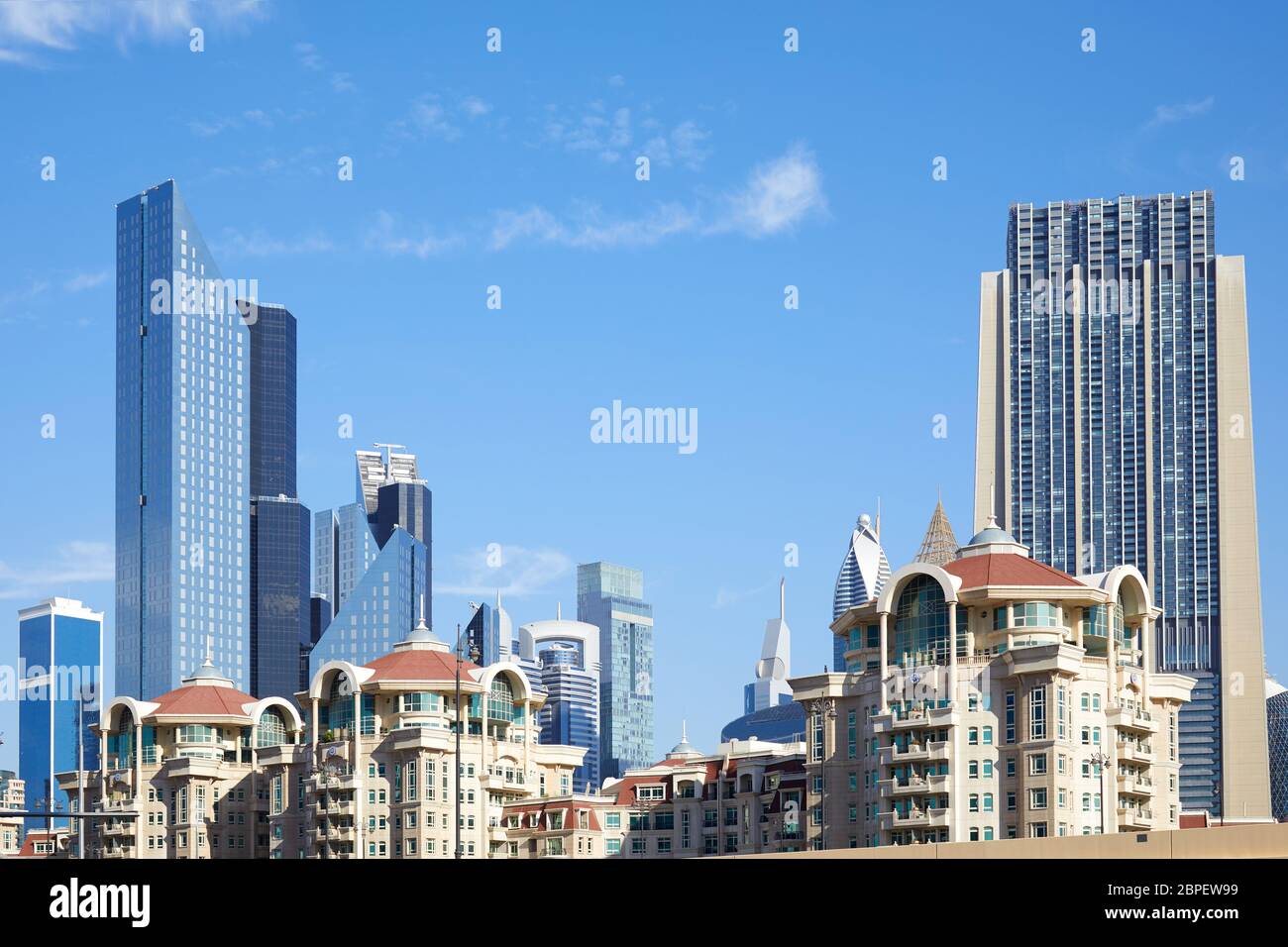 DUBAI, UNITED ARAB EMIRATES - NOVEMBER 23, 2019: Roda Al Murooj luxury hotel buildings with skyscrapers in a sunny day, blue sky Stock Photo