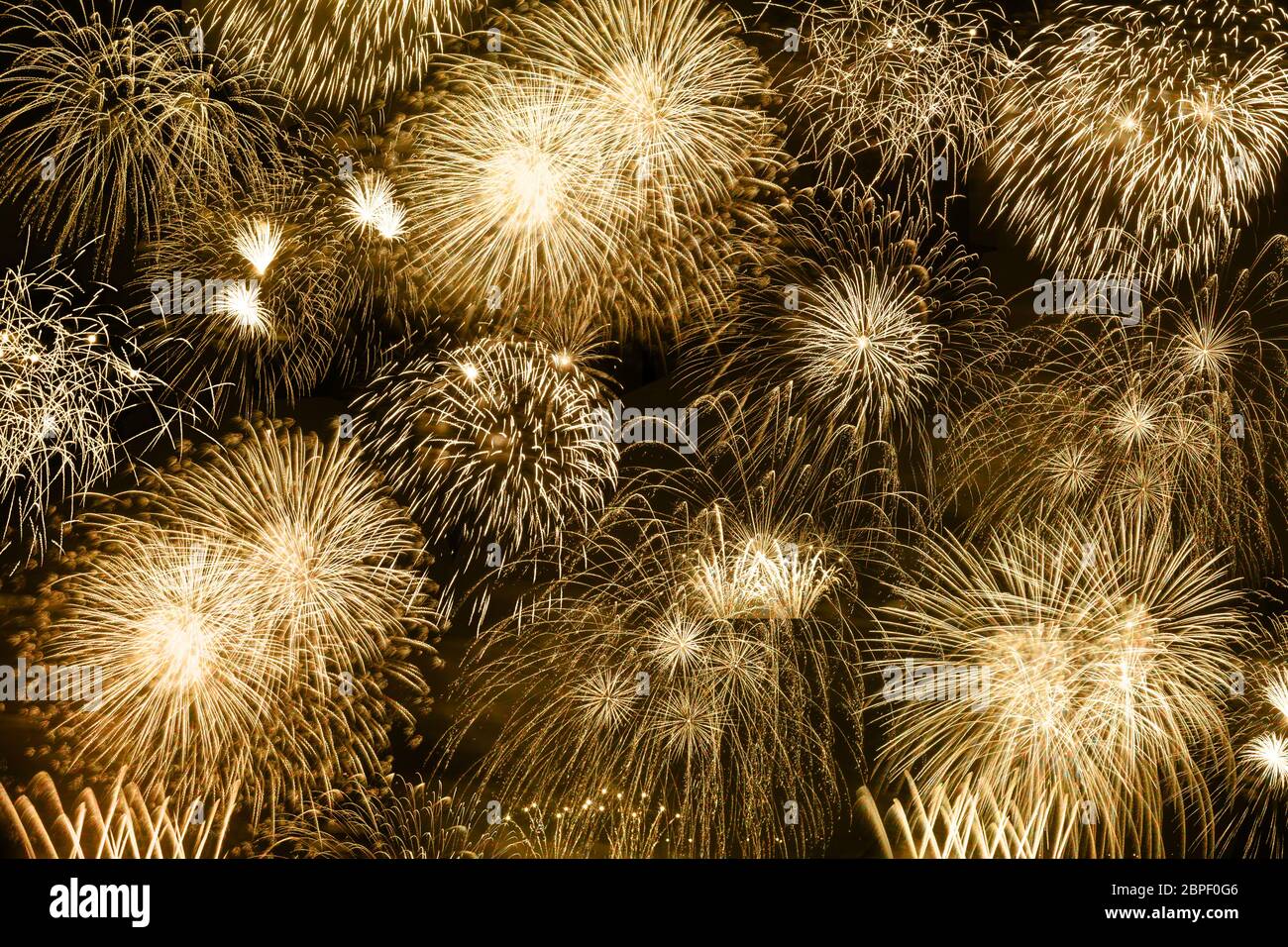 New Year's Eve fireworks gold golden background years year firework backgrounds Stock Photo