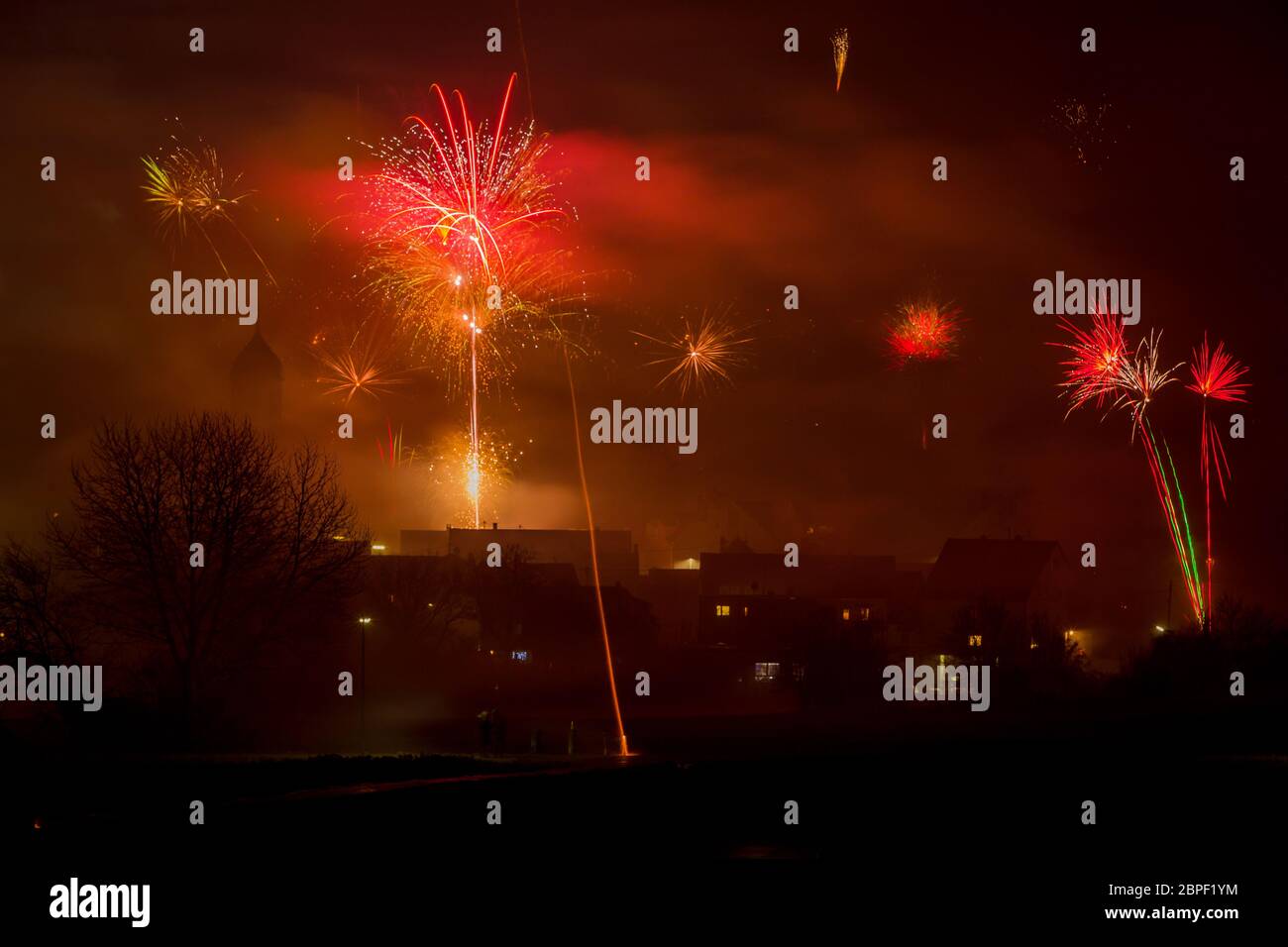 fireworks on new years eve 2019 with colorful rockets in the sky Stock Photo