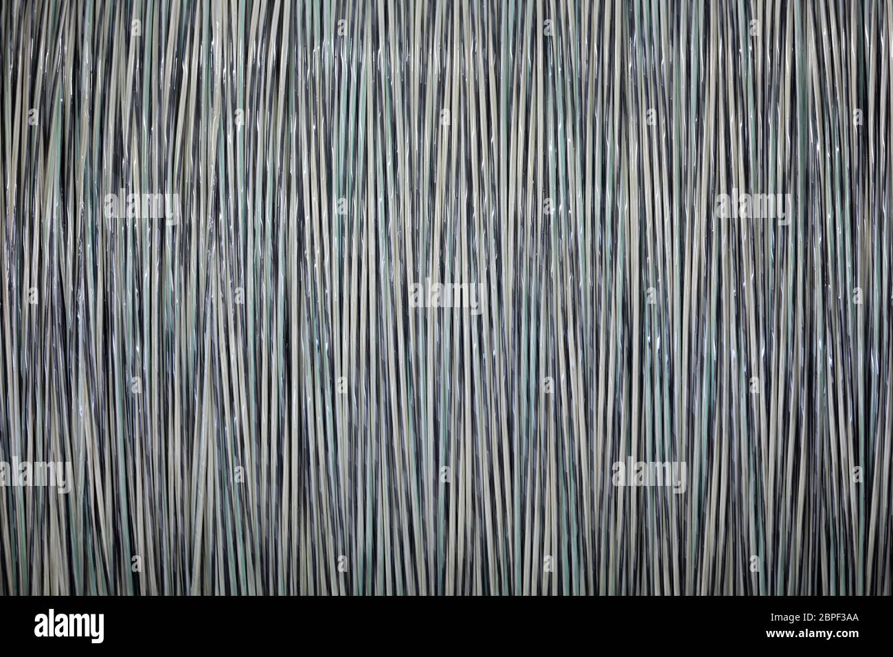 background or backdrop from fiber optic cable on reels Stock Photo
