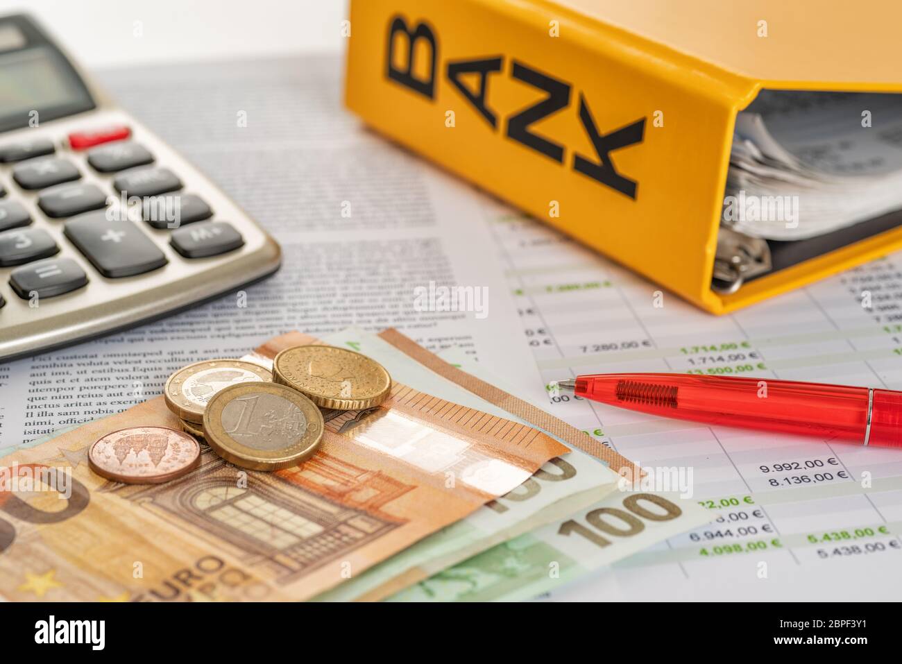 Euros with calculator and account statements Stock Photo