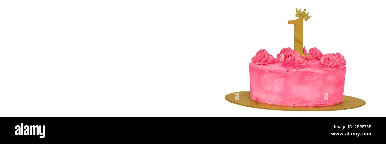 Pink cake banner with number 1 on a white background. First birthday. Stock Photo