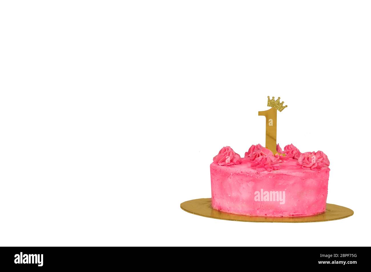 Background pink cake with the number 1 on a white background. First birthday. Stock Photo
