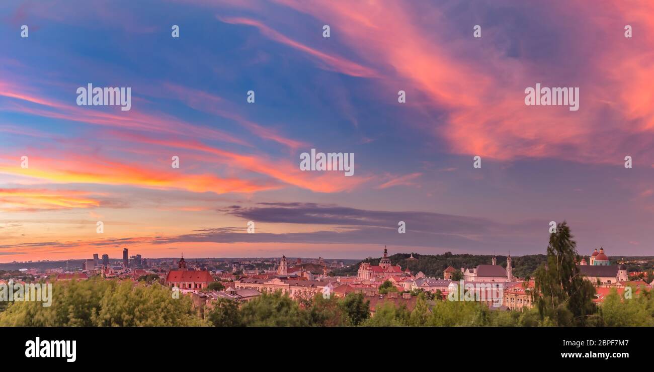 Aerial panoramic view over Old town of Vilnius and skyscrapers of New Center, Lithuania at beautiful sunrise, Baltic states. Stock Photo
