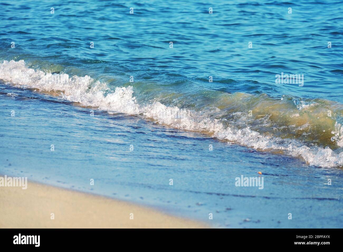 Sea wave on sandy hi-res stock photography and images - Alamy