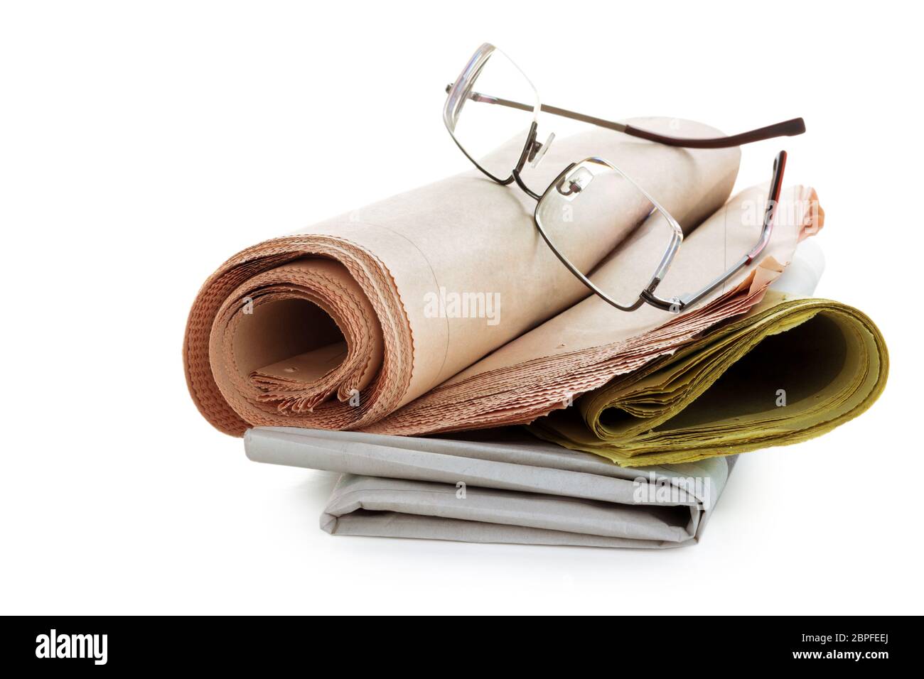 Coffee and newspapers isolated on white background. Stock Photo