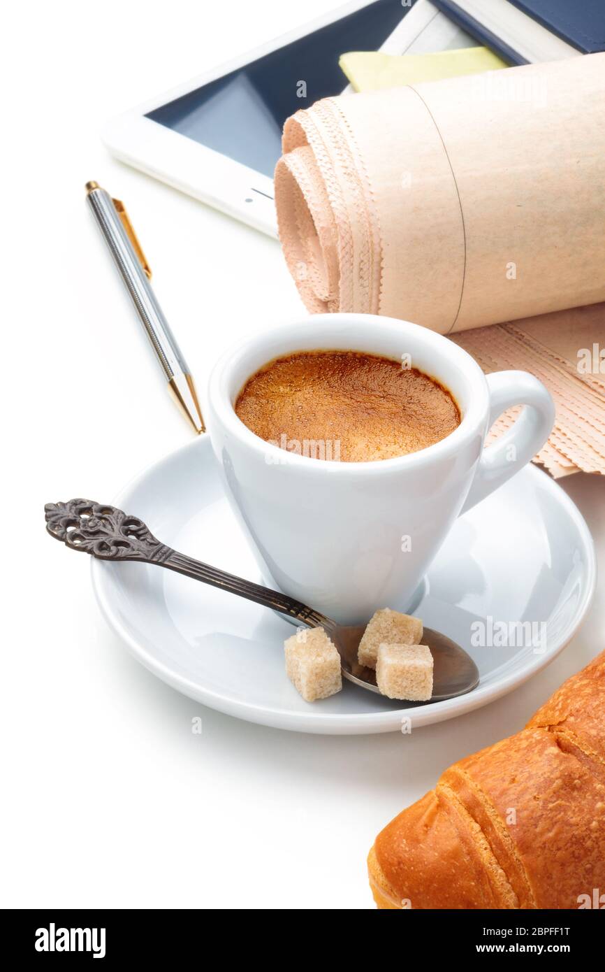 Coffee and newspapers isolated on white background. Stock Photo