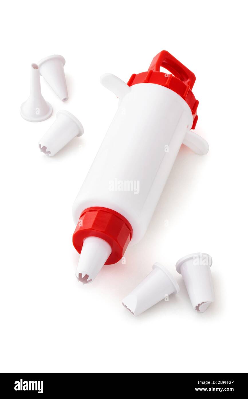 Closeup shot of culinary syringe isolated on white background Stock