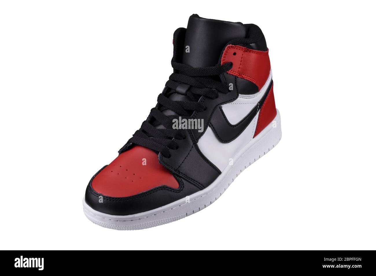 Side view of a high sneaker with red and black accents Stock Photo - Alamy