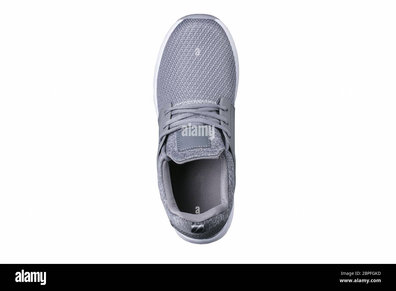 Sport shoes. Gray sneaker made of fabric with leather inserts top view