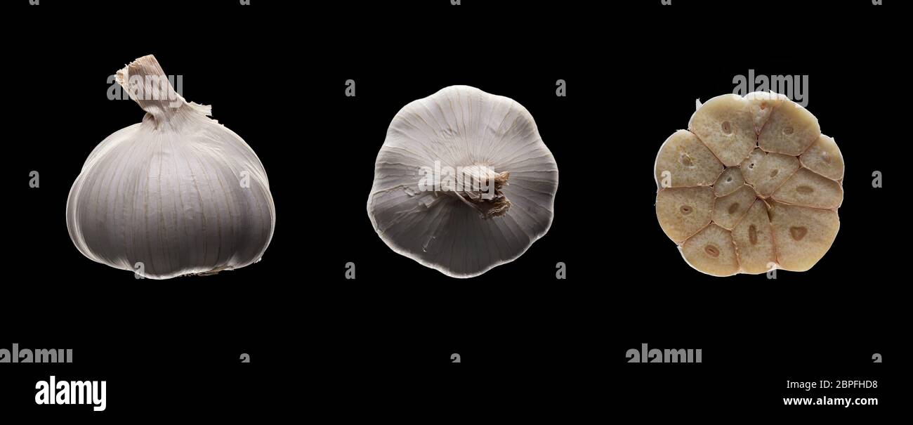 Whole fresh garlic on pure black background Stock Photo - Alamy