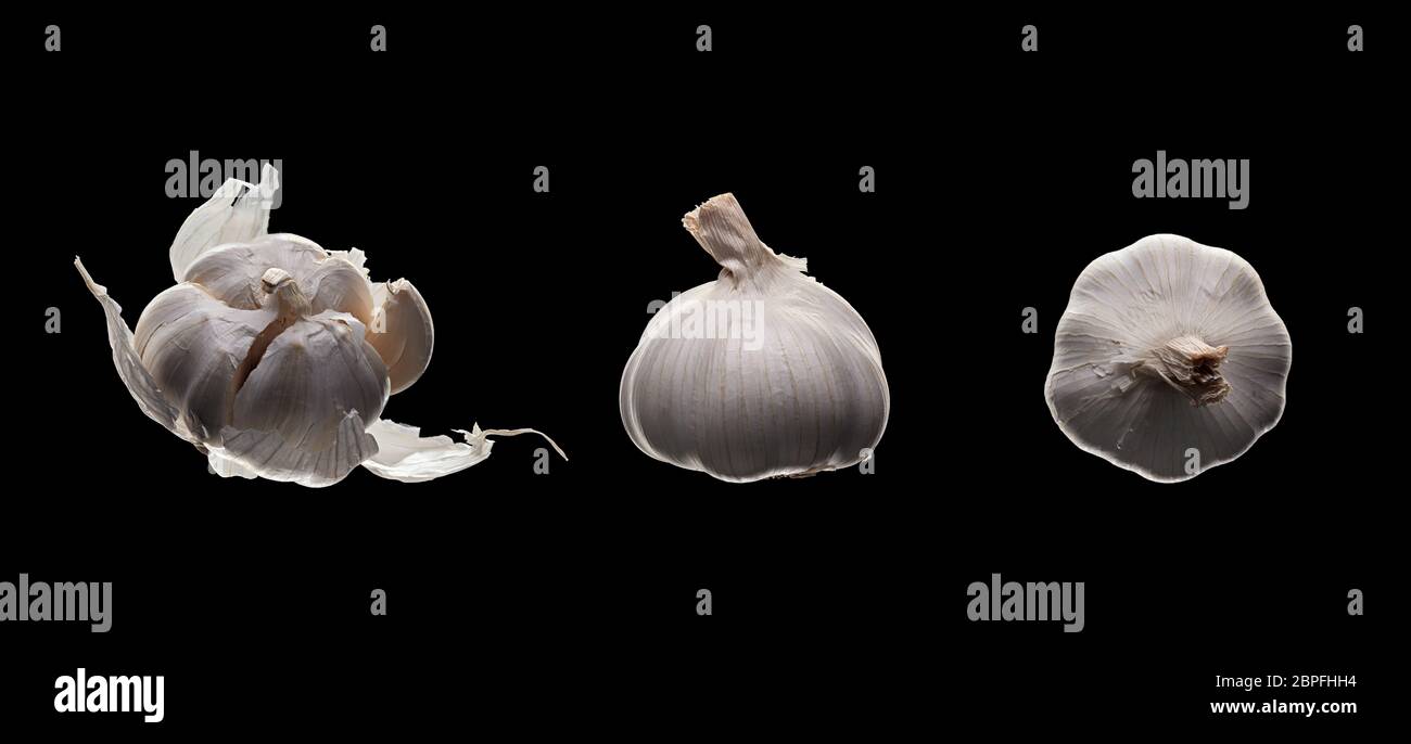 Whole fresh garlic on pure black background Stock Photo - Alamy