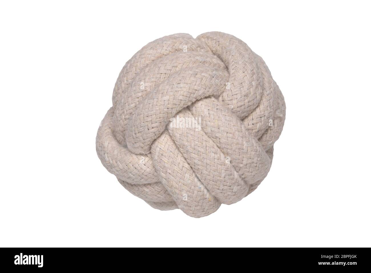 Rope isolated. Close-up of a rope knote ball. Macro. Knoted rope dog toy. Stock Photo