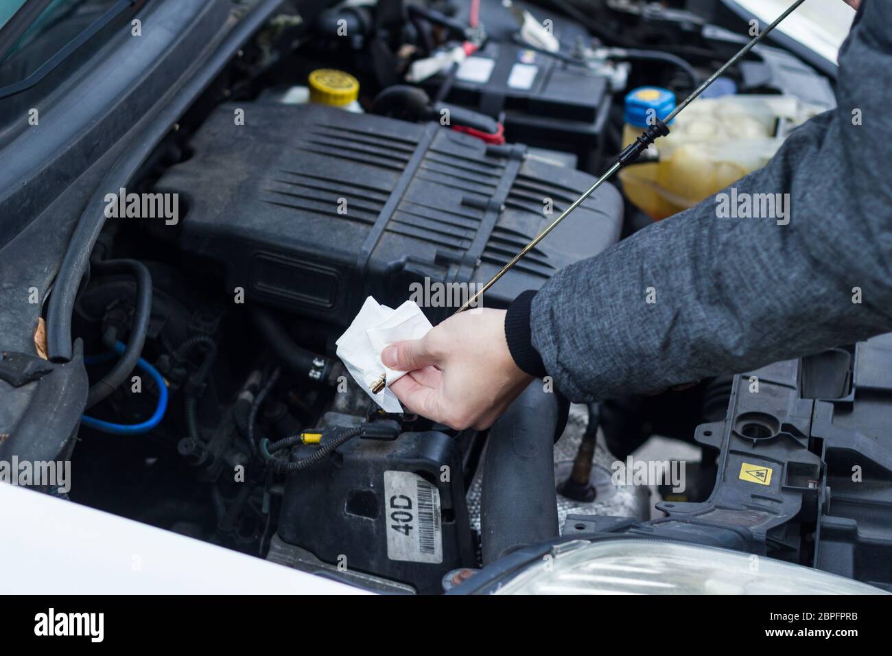 Oil dipstick hi-res stock photography and images - Alamy