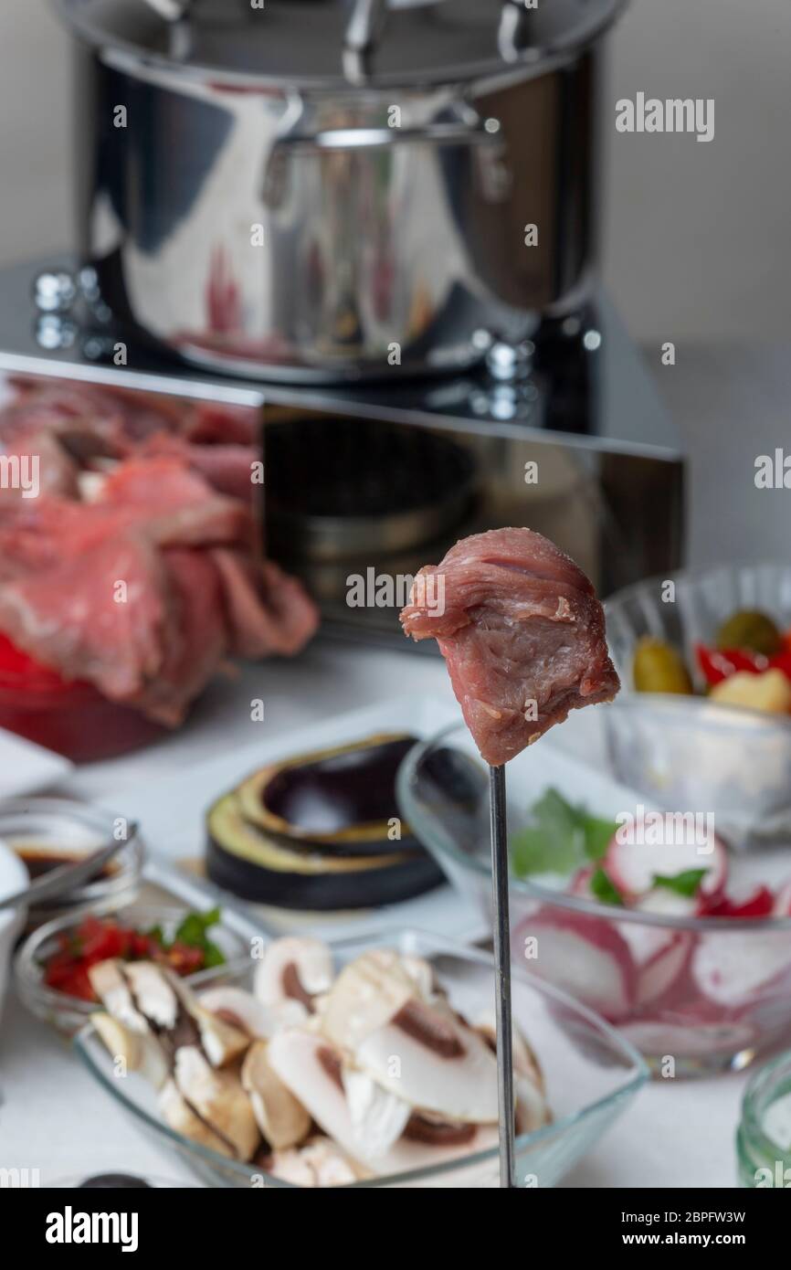 broth fondue with sauces Stock Photo Alamy