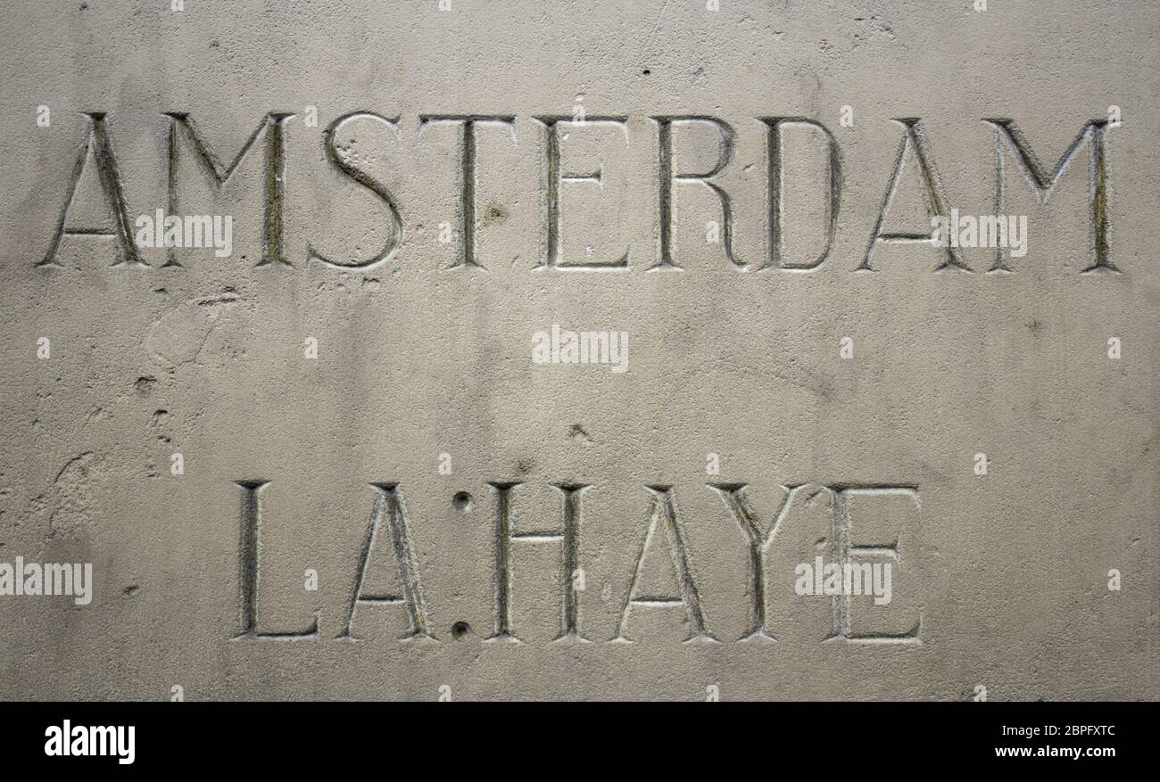 Amsterdam sign letter carved in stone, direction Stock Photo