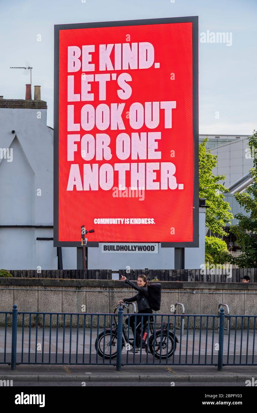 London, UK. 18th May, 2020. Be Kind and Look out for each other and Please Believe these days will pass - Other messages of hope on Billboards at the Shepherds Bush Roundabout. The 'lockdown' continues for the Coronavirus (Covid 19) outbreak in London. Credit: Guy Bell/Alamy Live News Stock Photo
