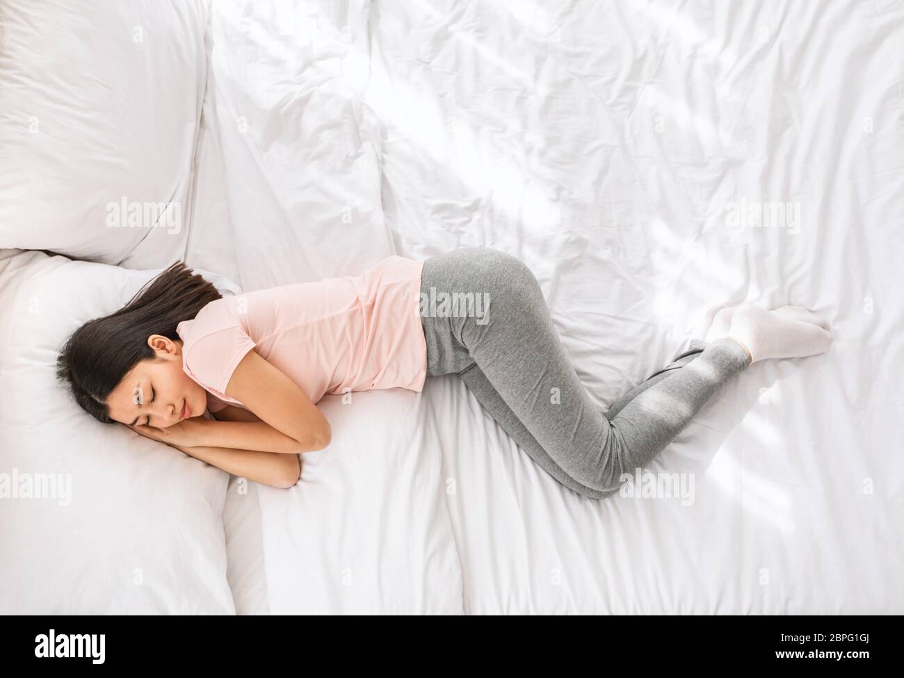 Woman sleeping hi-res stock photography and images - Alamy