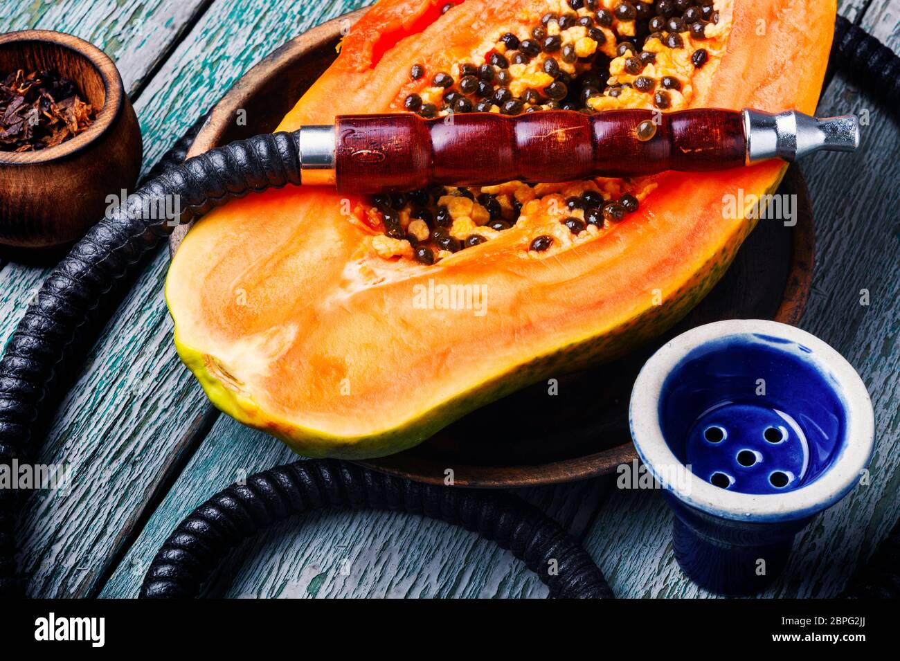 Oriental exotic hookah with papaya fruit flavor.Smoking Turkish shisha