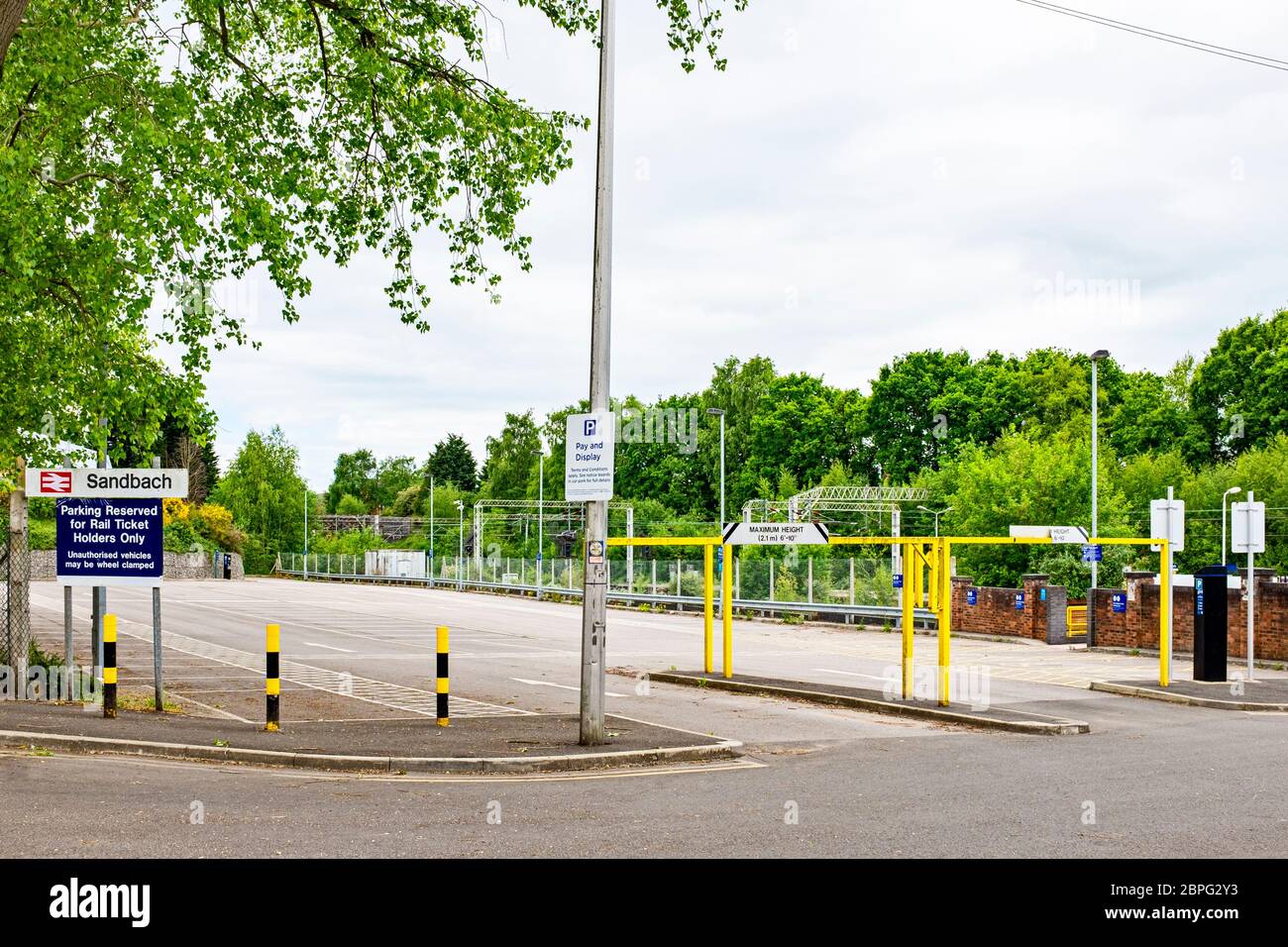 Deserted car park, due to coronavirus, on train station in Sandbach Cheshire UK Stock Photo