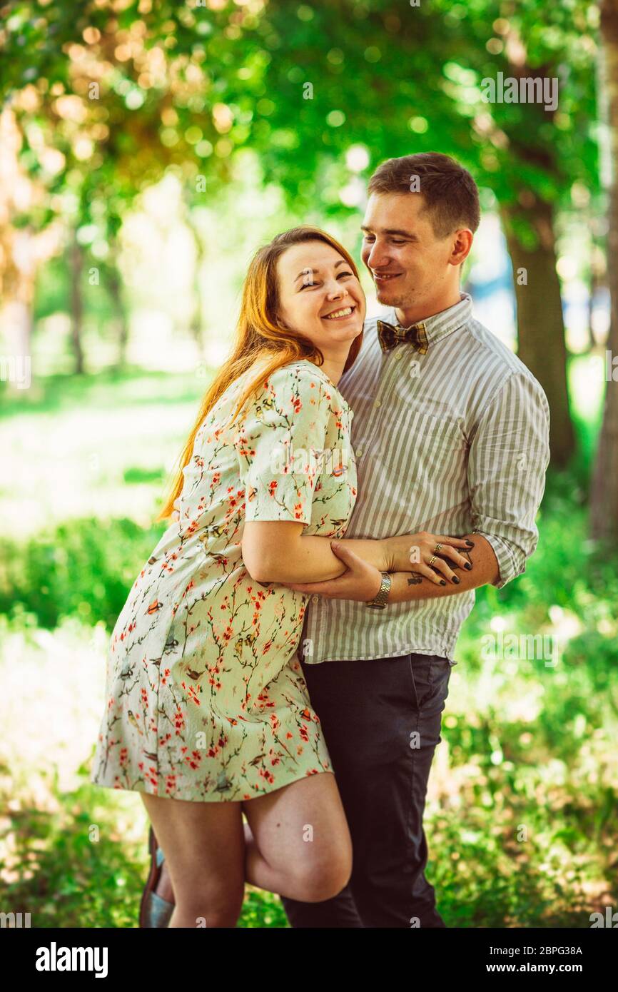 Beautiful couple on a natural background Stock Photo - Alamy