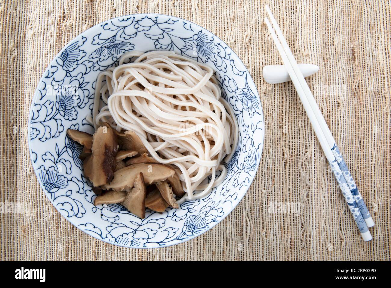Filling bowl with udon noodle soup series image three bowl with