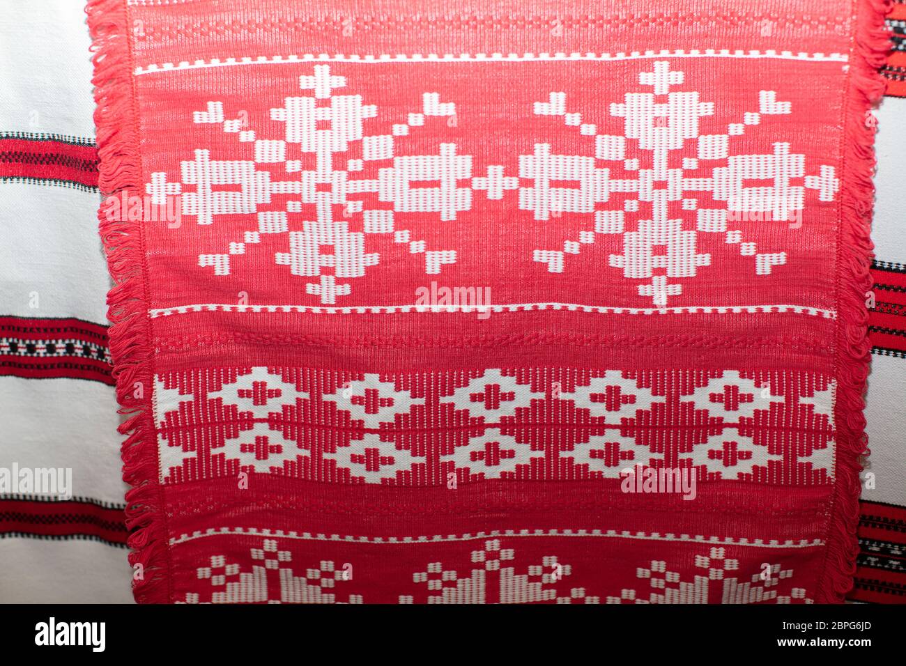 Slavic rushnyks. Canvases of fabric with national Belarusian Russian Ukrainian pattern. Embroidery. Stock Photo