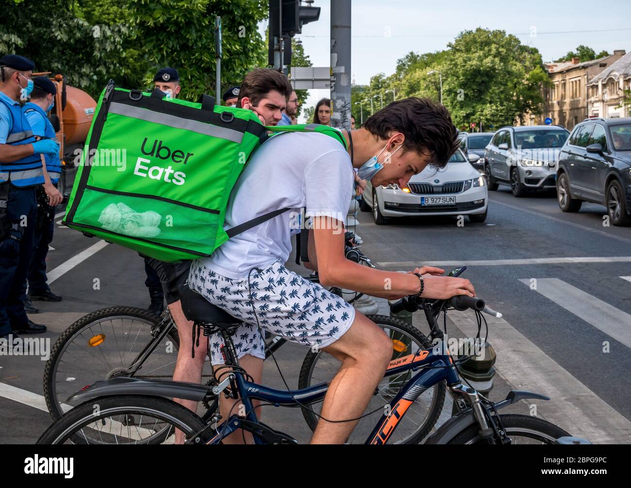 Bucharest/Romania - 05.17.2020: Uber eats courier on a bicycle at 