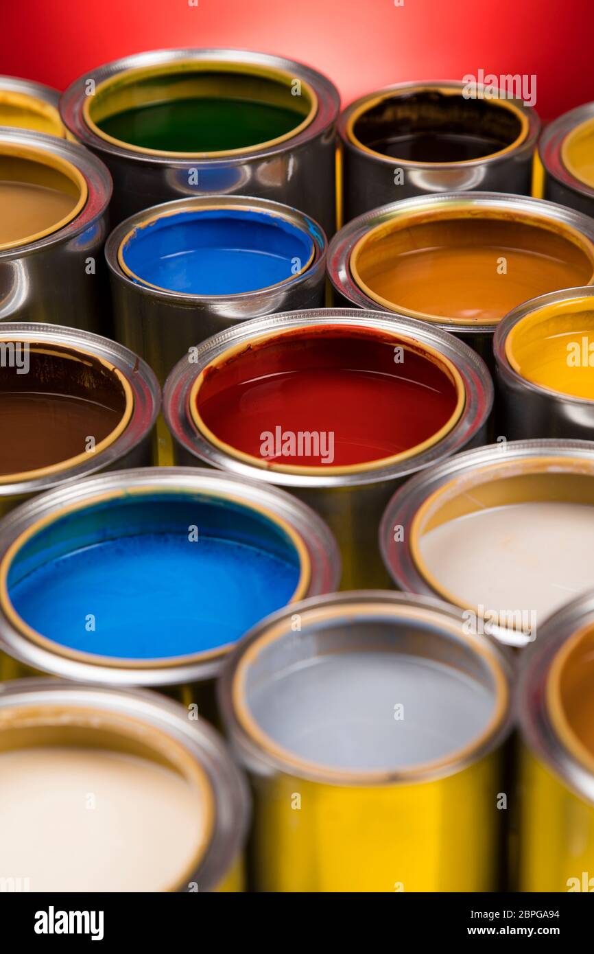 Group of Brush, tin metal cans with color paint Stock Photo - Alamy