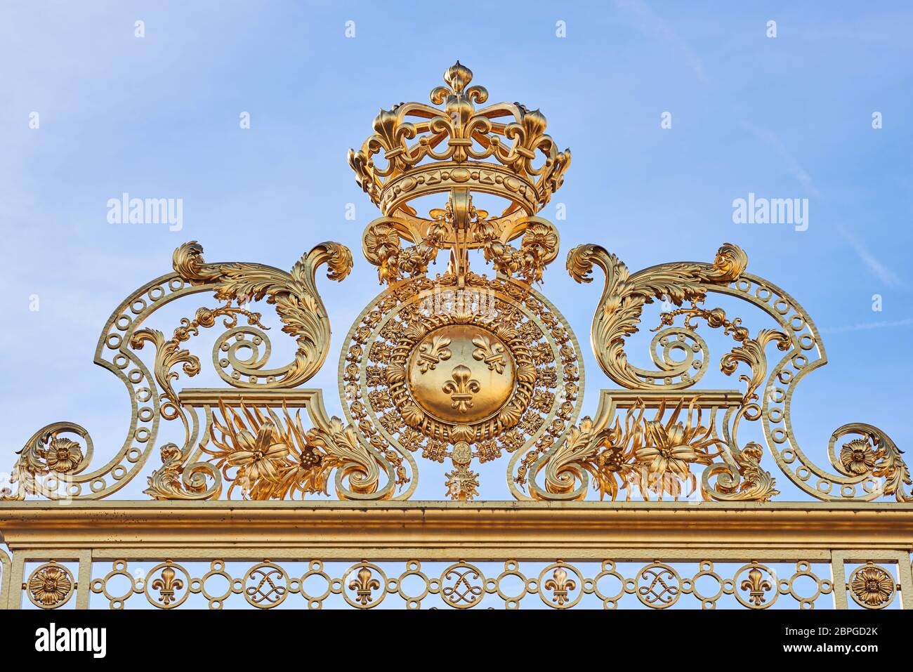 Golden Entrance Gates of the Palace of Versailles. Close up shot. Paris