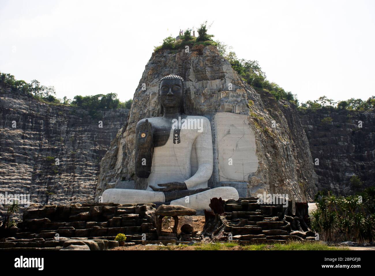 SUPHAN BURI, THAILAND OCTOBER 28 Big buddha carving on stone cliff