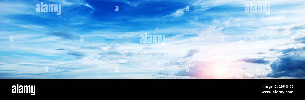 Sunrise summer sky panorama. Art air clouds background Stock Photo - Alamy