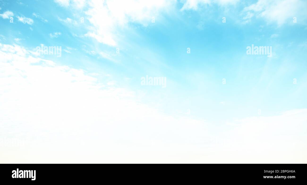 Clear blue sky and white clouds summer background Stock Photo - Alamy
