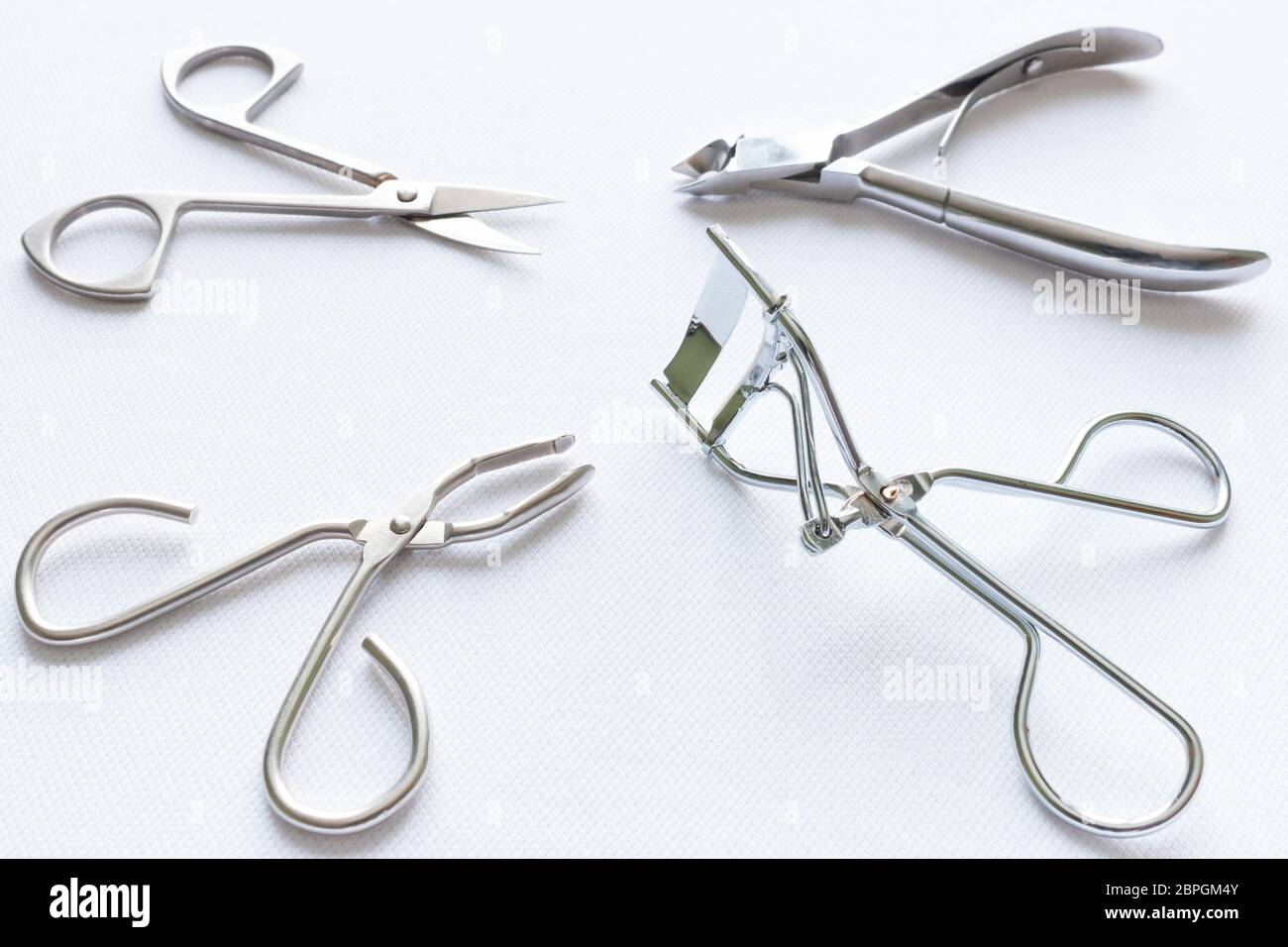 nail scissors and other accessories on a white background Stock Photo