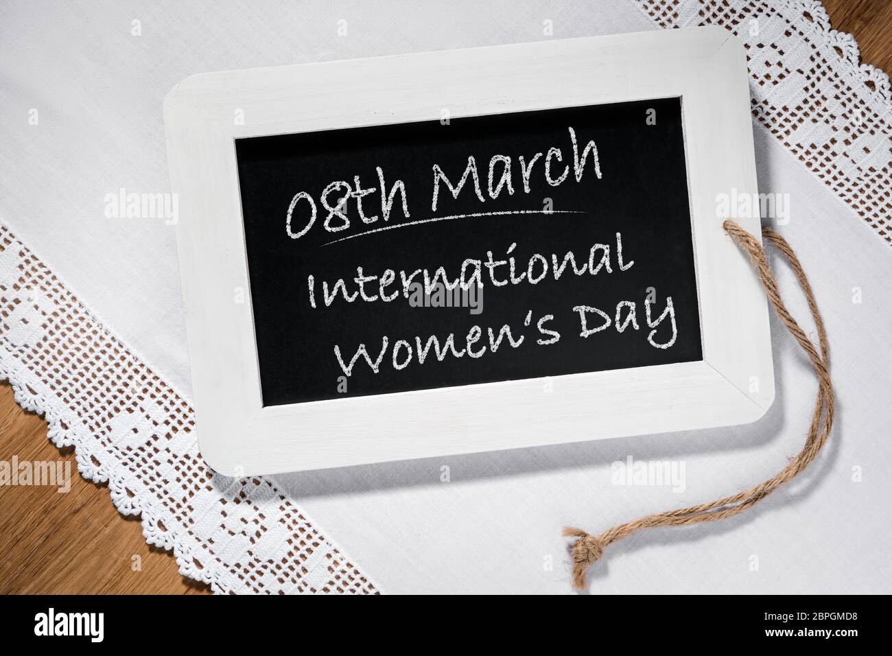 8 March Message Image of a slate blackboard on a table with chalk message 8th March ...