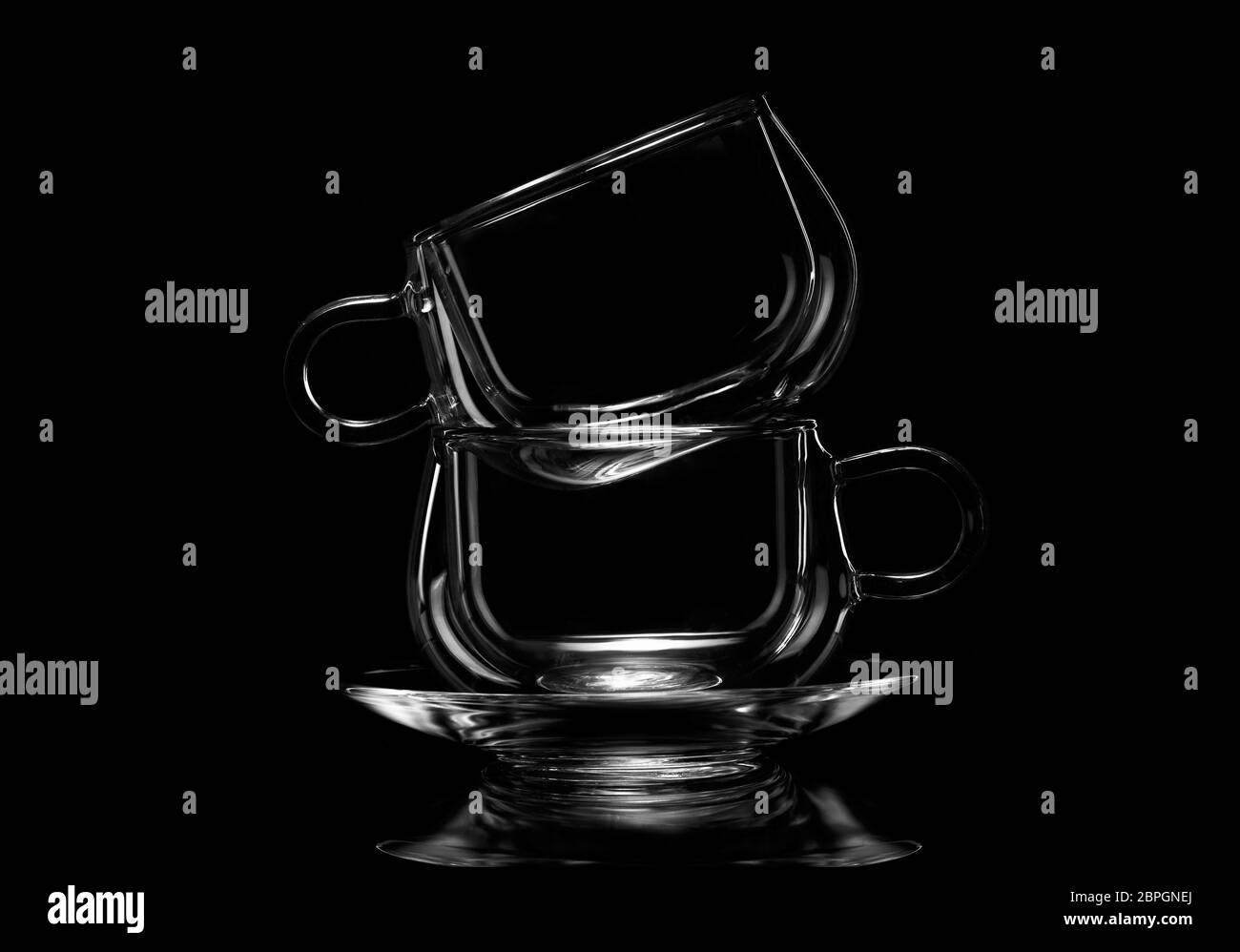 Glass empty cups on a black background Stock Photo Alamy