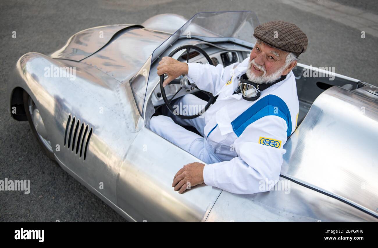 19 May 2020, Saxony, Chemnitz: Frieder Bach, collector and restorer of classic cars, is sitting in the last and brand new DKW F9 sports car in Chemnitz. Bach brought the vehicle to life after a drawing from 1940, which he discovered by chance during research for an exhibition in the Museum of Saxon Vehicles. It was the sketch for the last sports car that DKW, then under the umbrella of Auto Union, wanted to build. The vehicle was originally to take part in the Berlin - Rome race in 1938, but the war prevented it from being produced. More than 75 years later, the car was now built, with the he Stock Photo