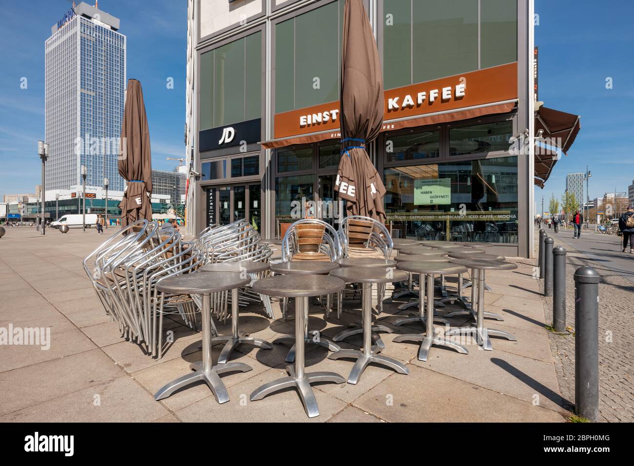 Cafe Einstein, Alexanderplatz, Berlin, Germany. Stacked chairs, empty tables - during the corona crisis, only coffee and snacks to take away can be so Stock Photo