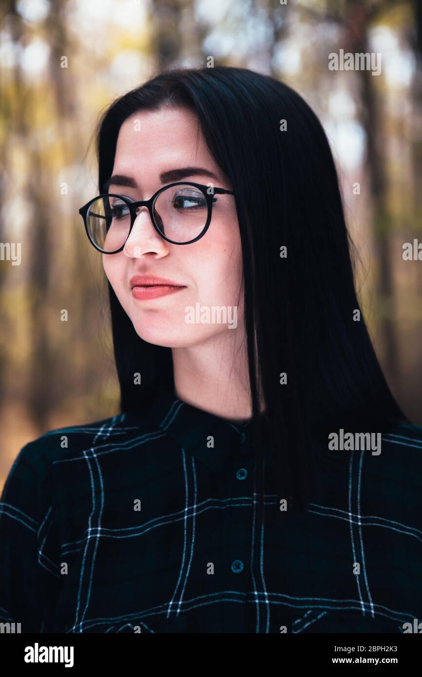 portrait of a young woman in the autumn forest Stock Photo - Alamy