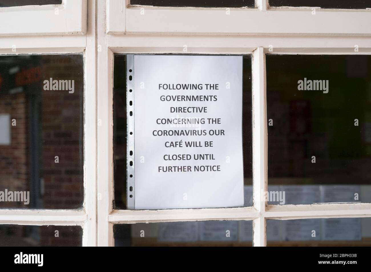 Customer notice in a cafe window during the Covid-19 pandemic,  Market Harborough, Leicestershire, England. Stock Photo